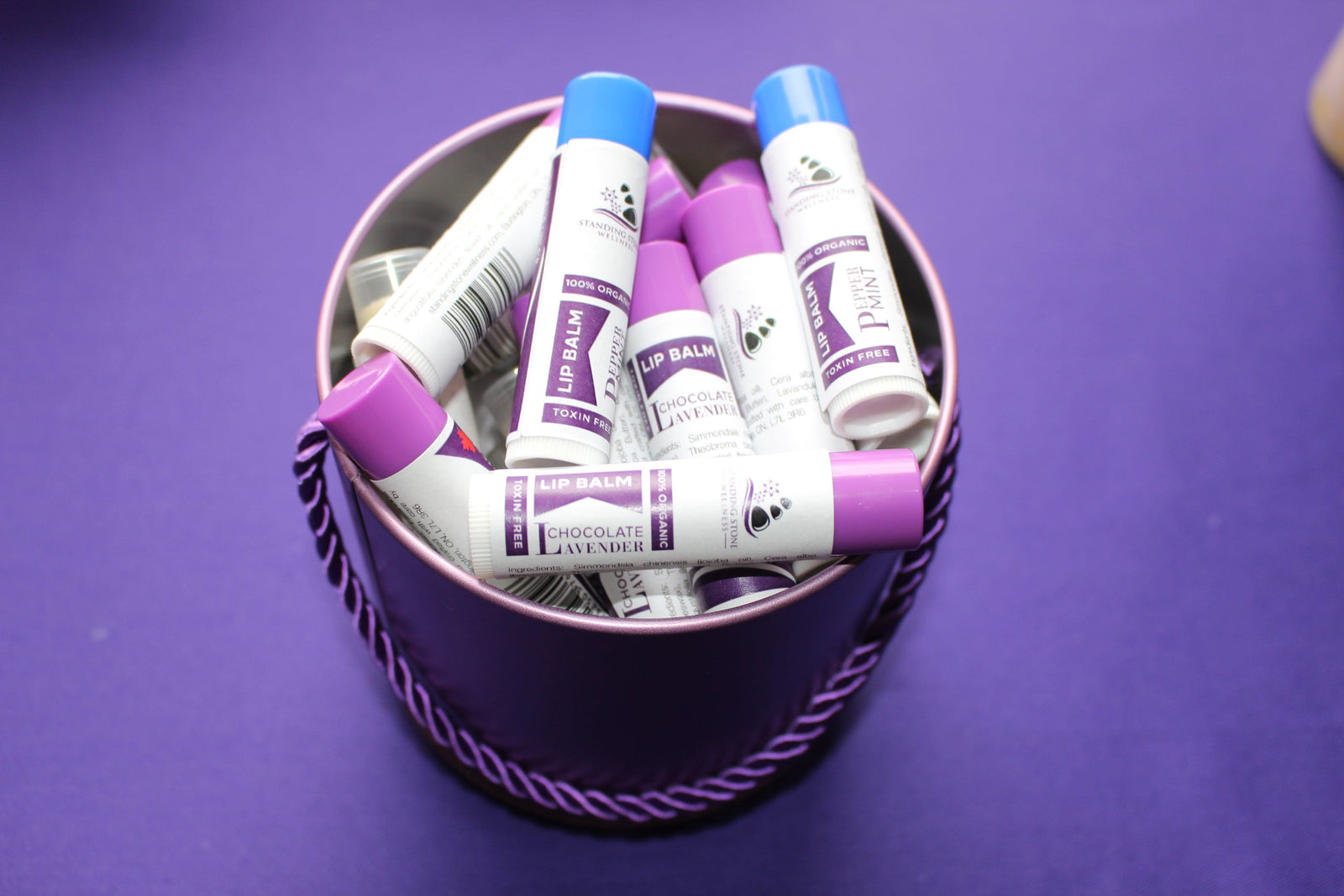 Bin of lip balms image